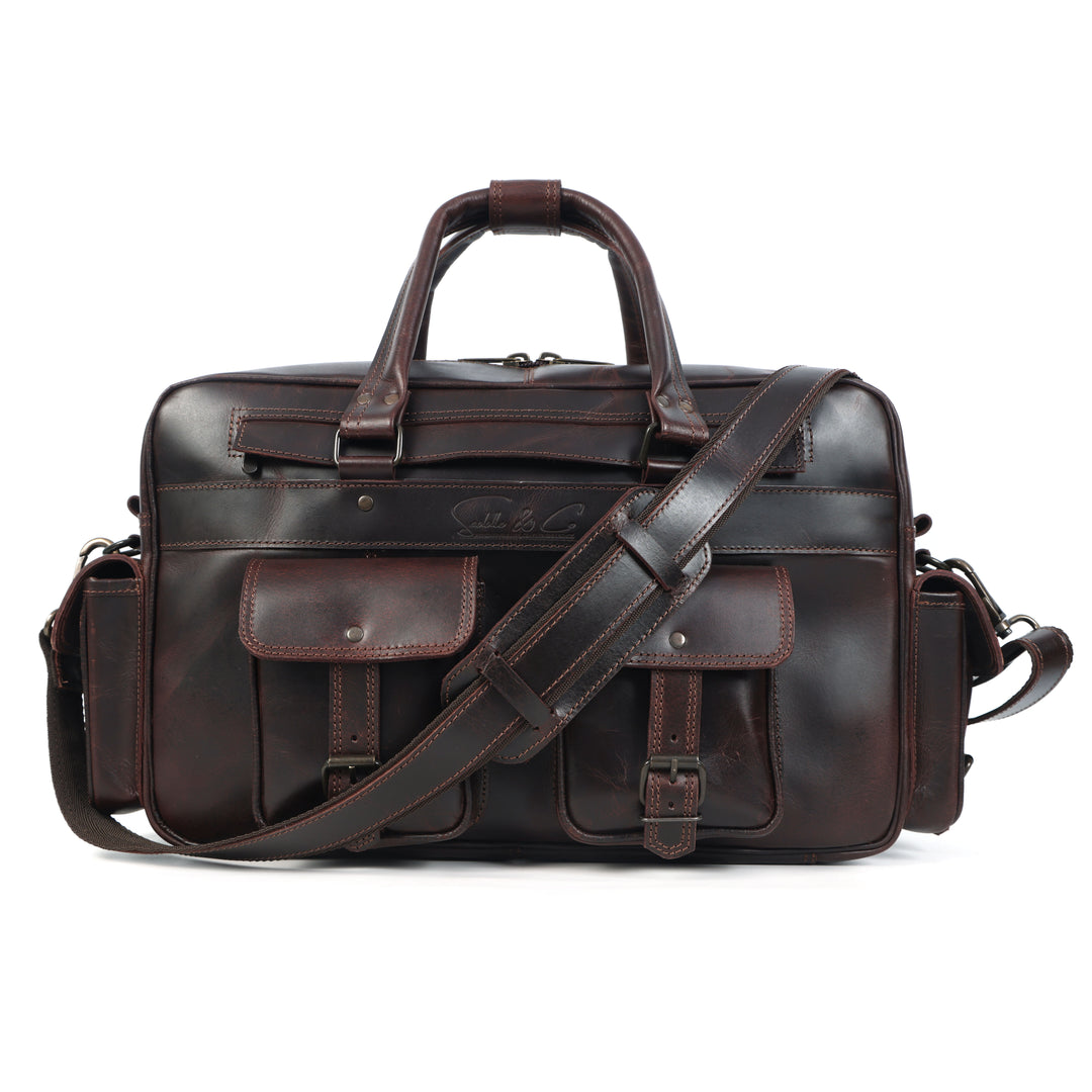 Brown leather briefcase with shoulder strap on a white background