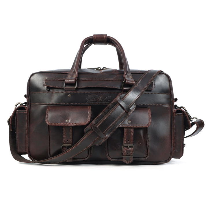 Brown leather briefcase with shoulder strap on a white background