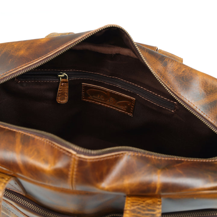 Brown leather bag with visible brand logo on a white background
