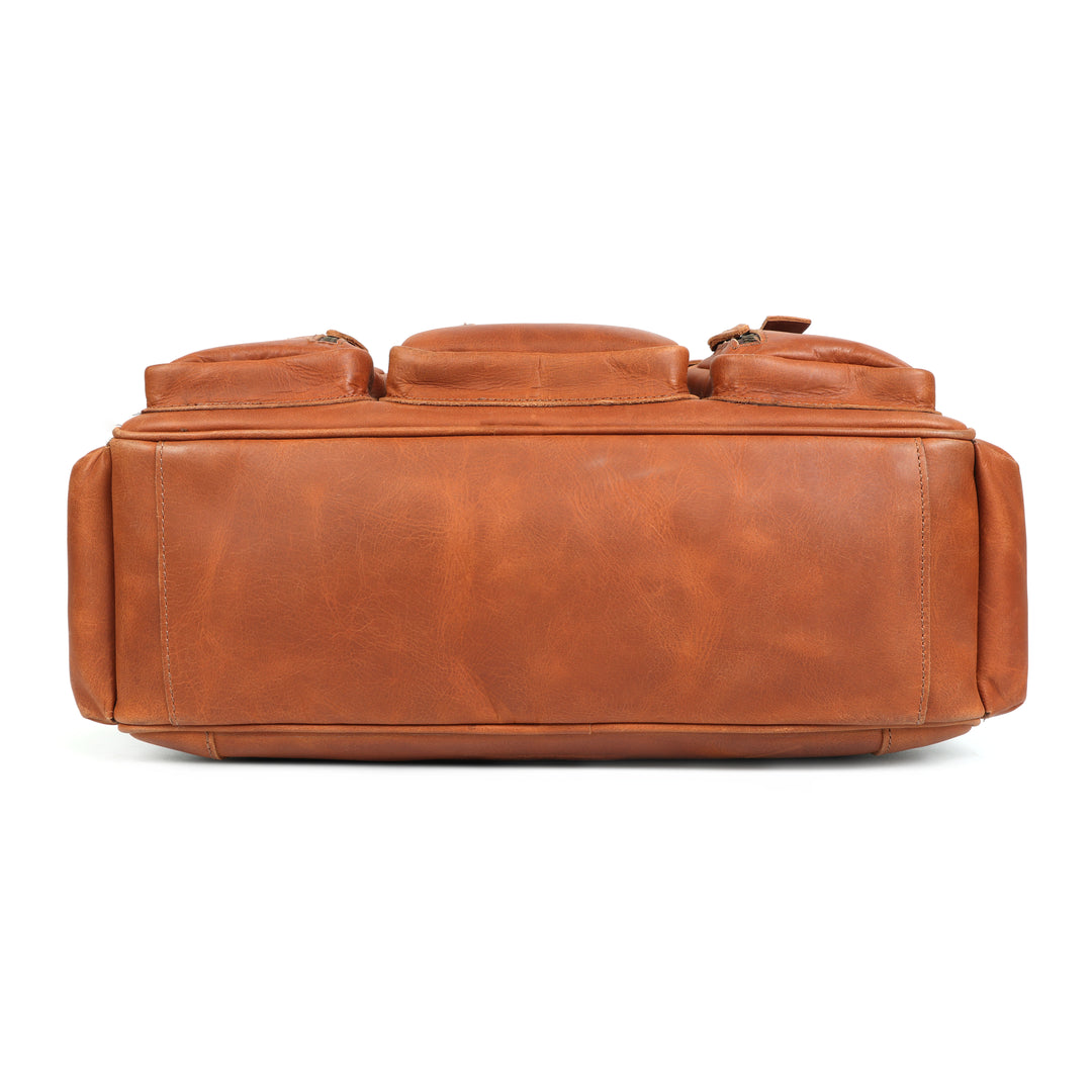 Brown leather duffel bag on a white background