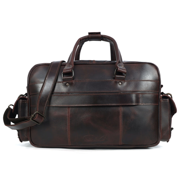 Brown leather briefcase with shoulder strap on a white background