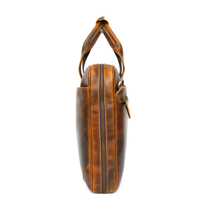 Brown leather bag with a handle on a white background