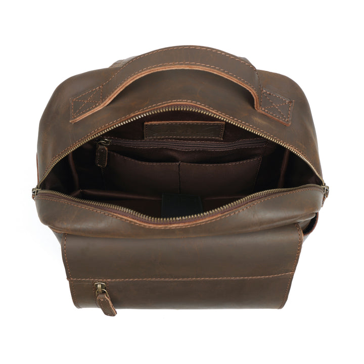 Brown leather bag with open top on a white background