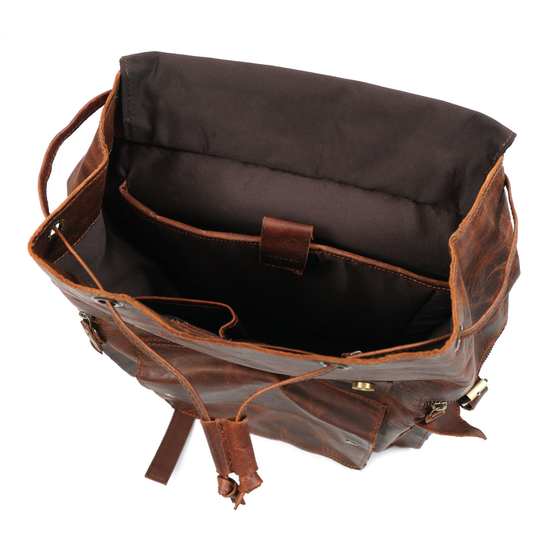 Brown leather bag with visible stitching on a white background