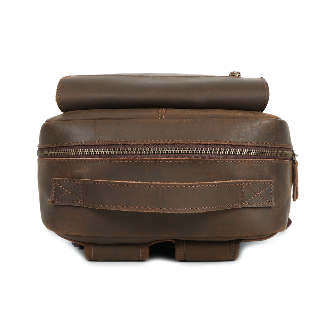 Brown leather bag with a zipper on a white background