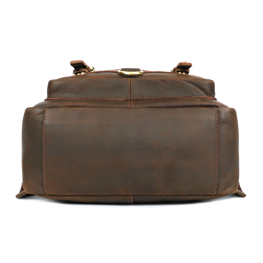 Brown leather duffel bag on a white background