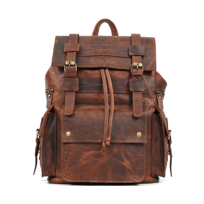 Brown leather backpack on a white background