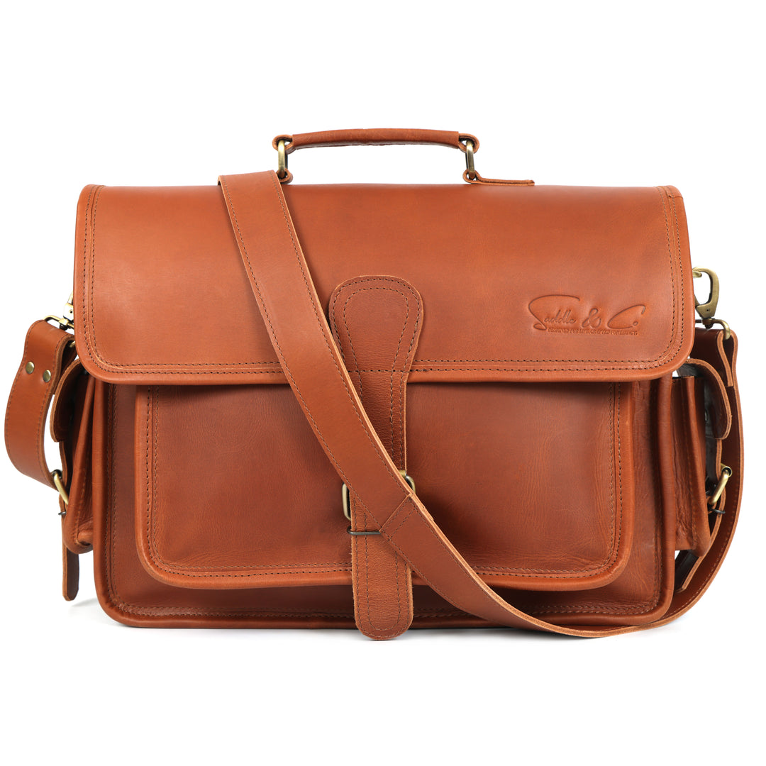 Brown leather satchel bag with a visible brand logo on a white background
