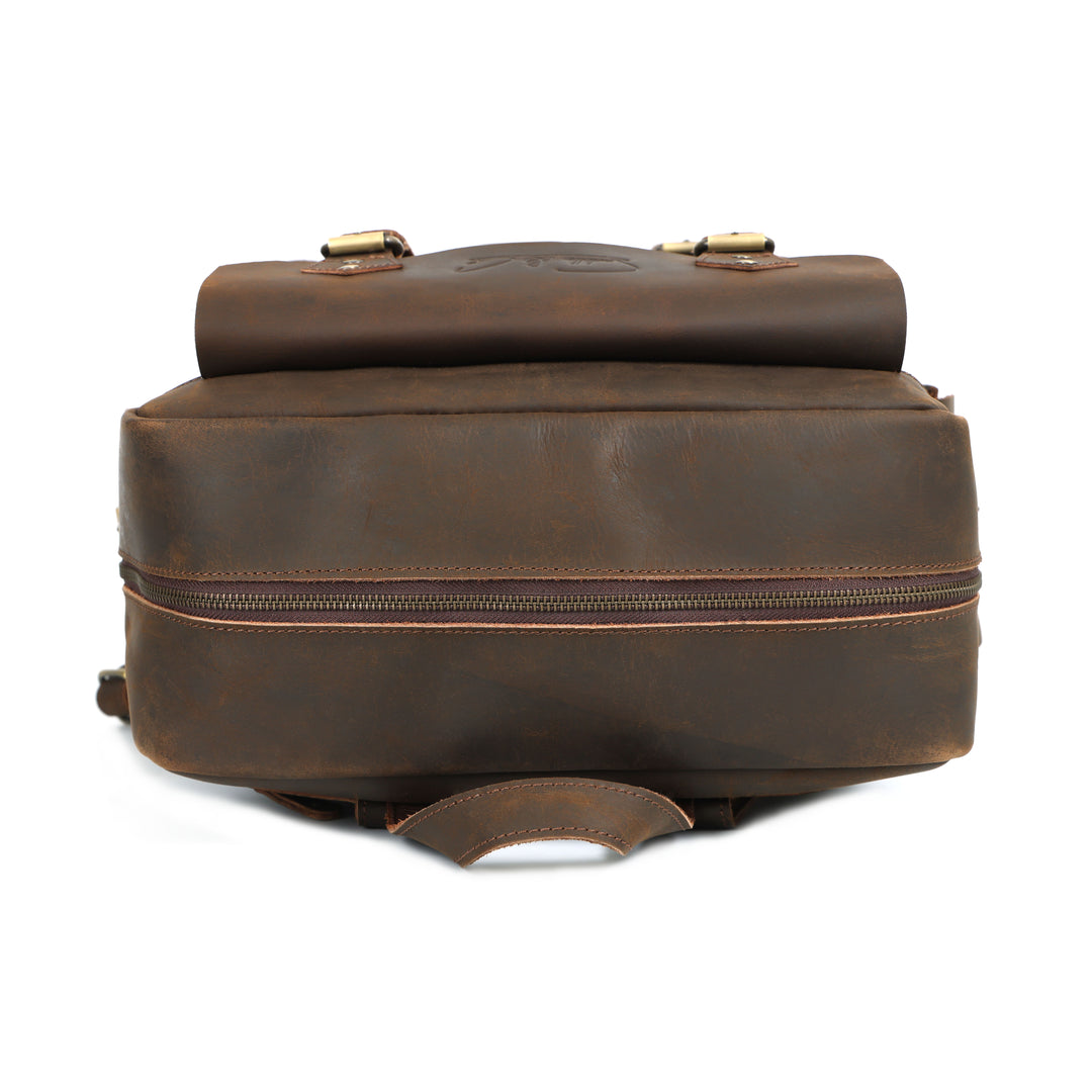 Brown leather bag with a zipper on a white background