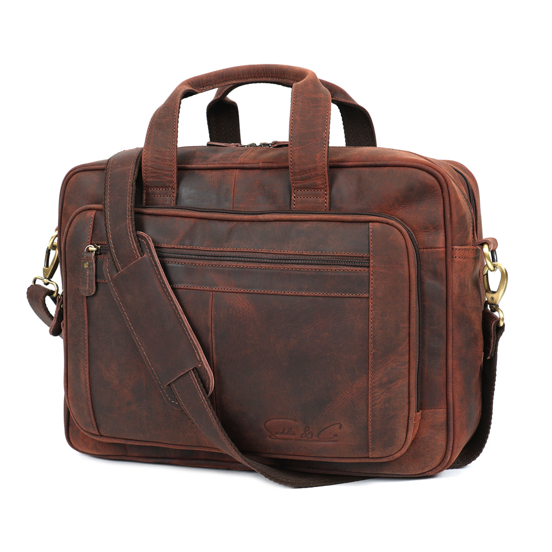 Brown leather briefcase with shoulder strap on a white background