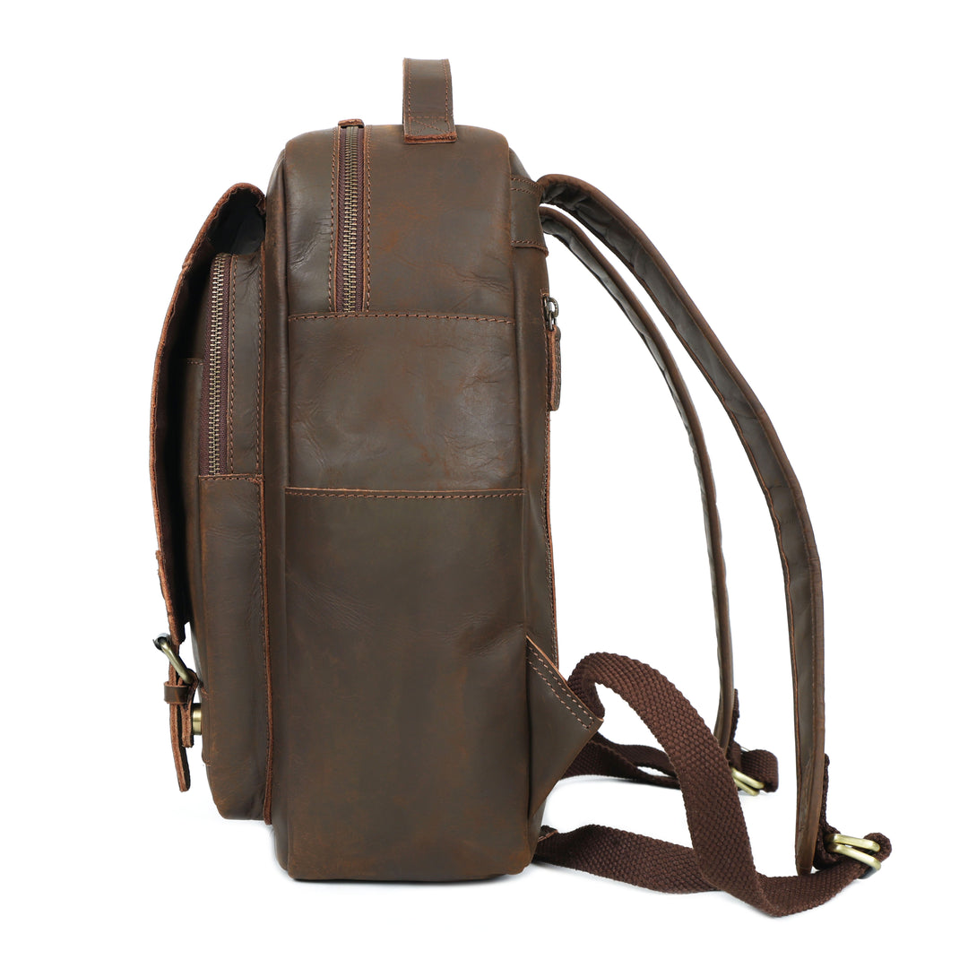 Brown leather backpack on a white background