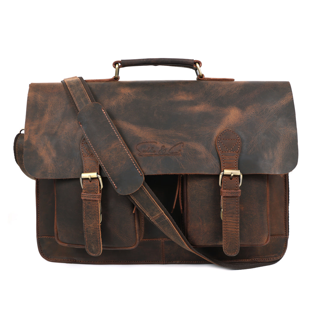 Brown leather satchel bag with shoulder strap on a white background