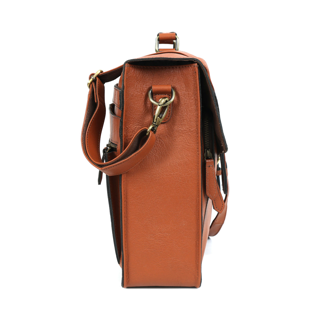 Brown leather bag with a gold clasp on a white background