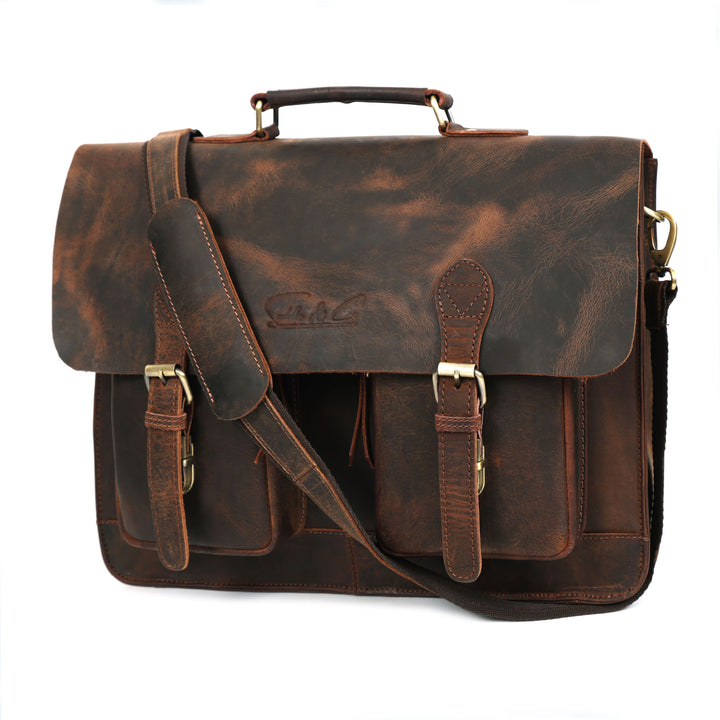 Brown leather satchel bag with gold buckles on a white background