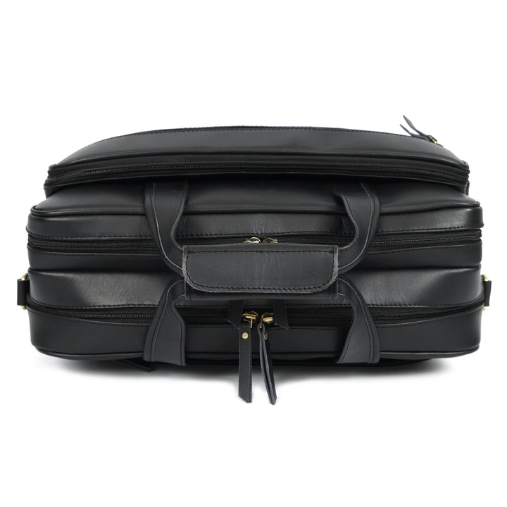 Black leather briefcase with multiple compartments on a white background