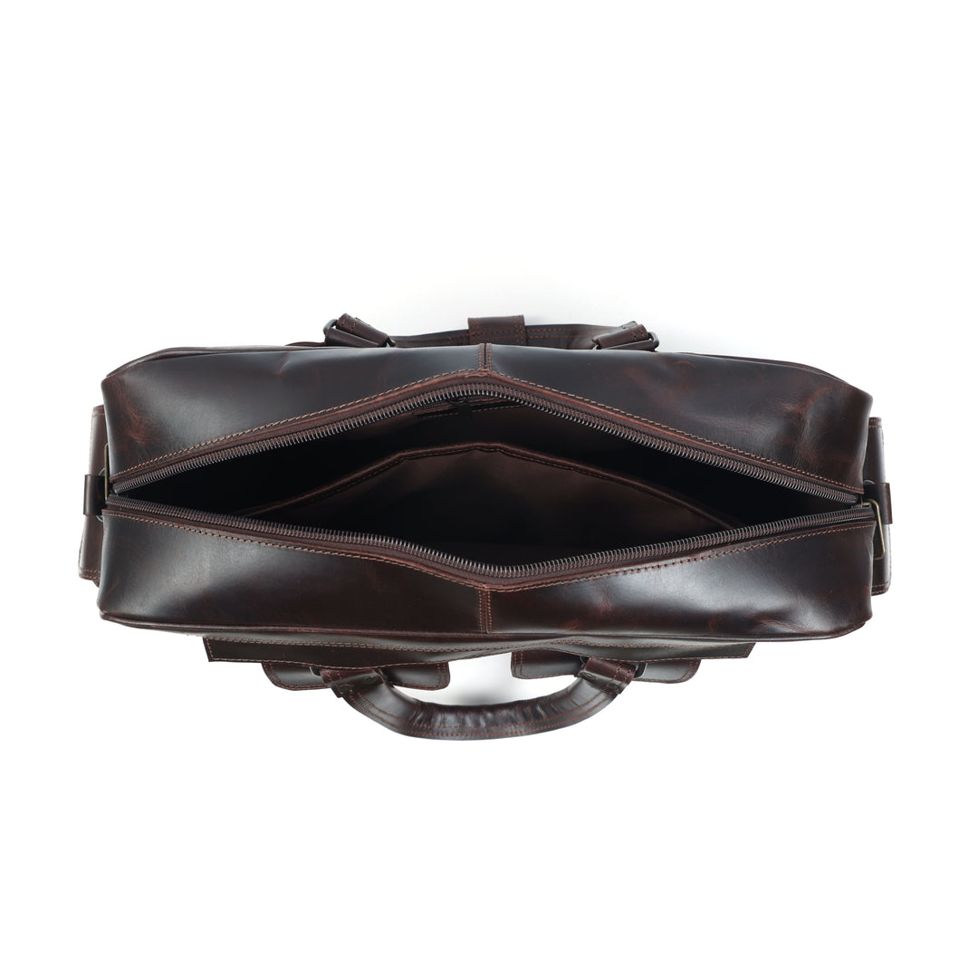 Brown leather bag on a white background