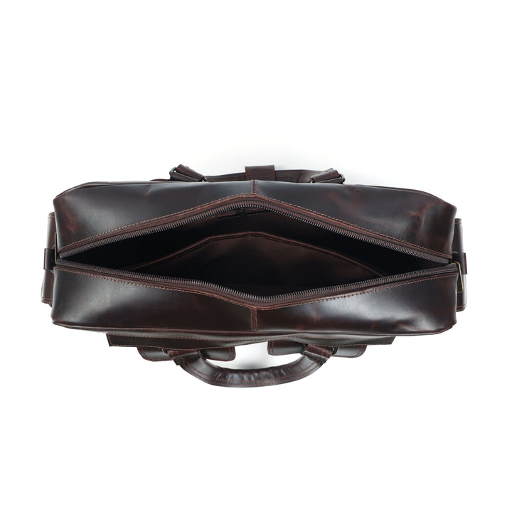 Brown leather bag on a white background