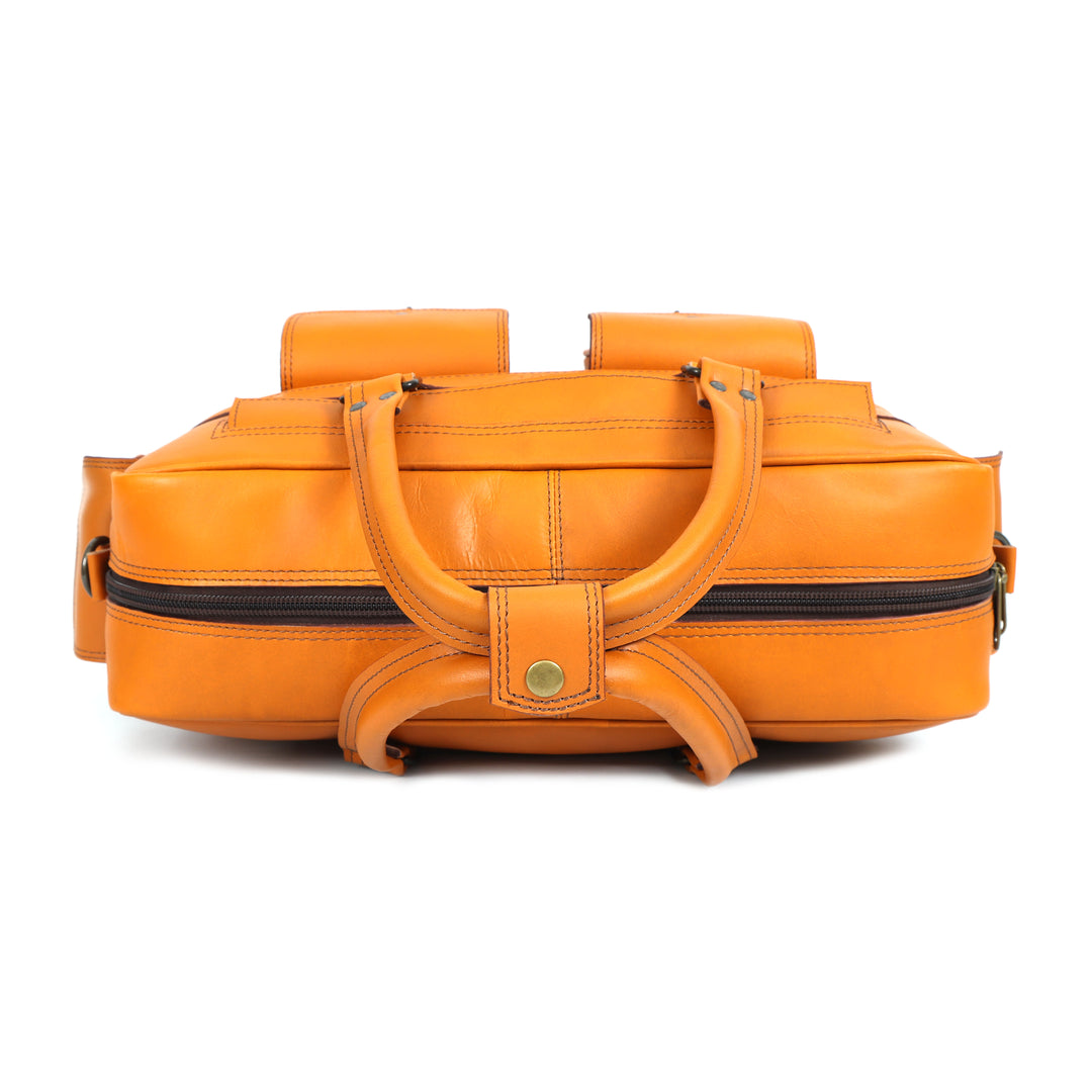 Orange leather bag with handles on a white background