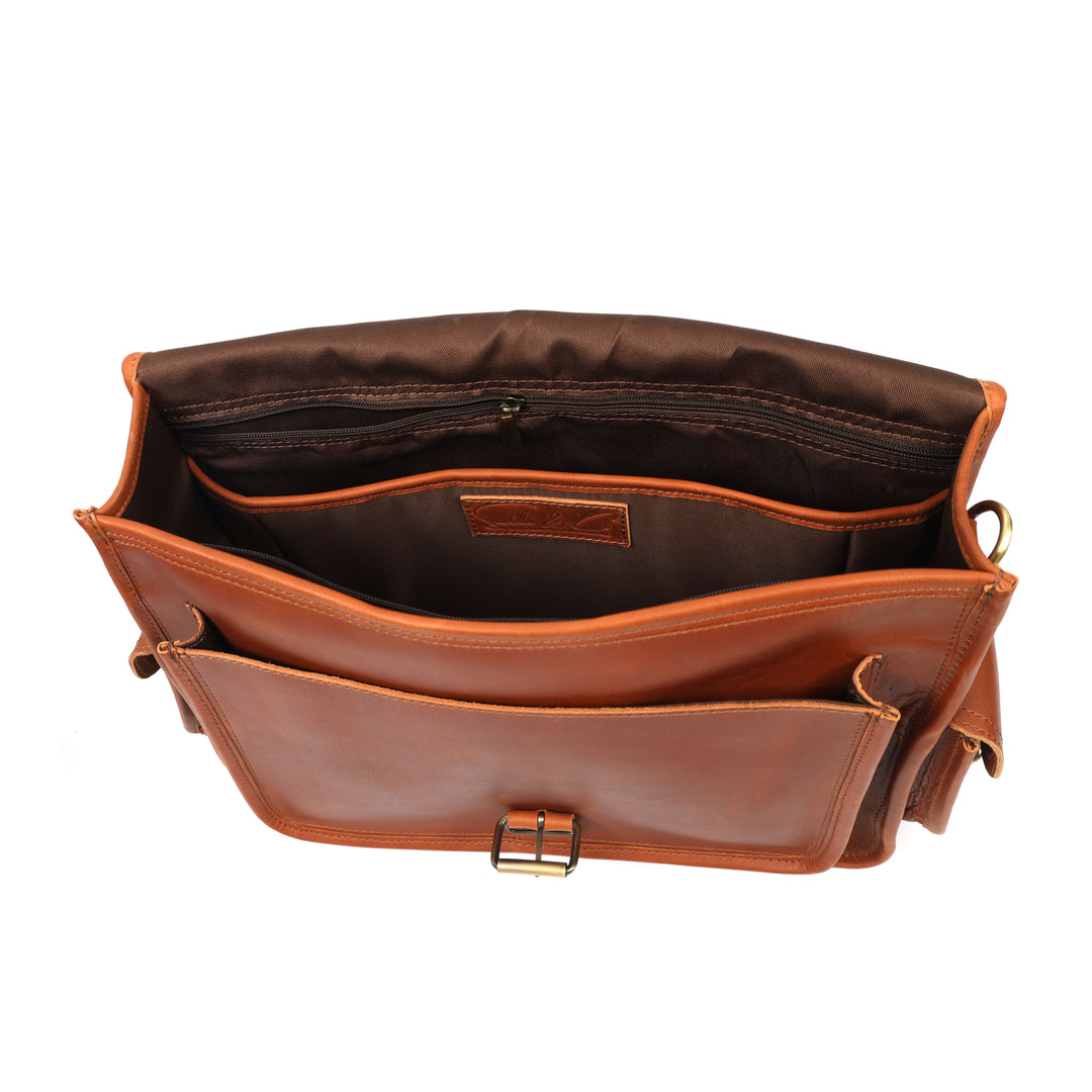 Brown leather bag with open compartments on a white background