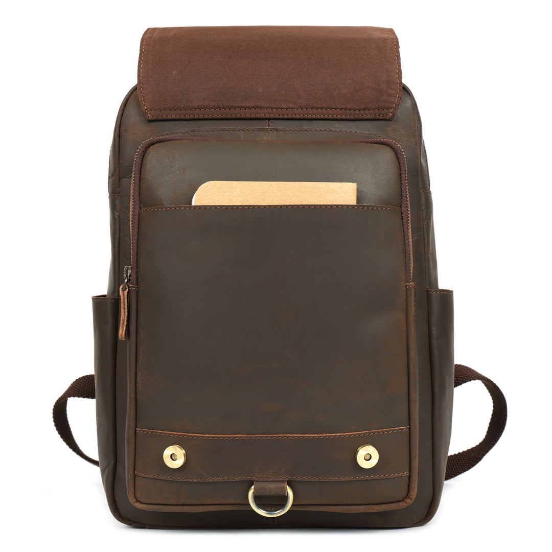 Brown leather backpack with a front pocket on a white background