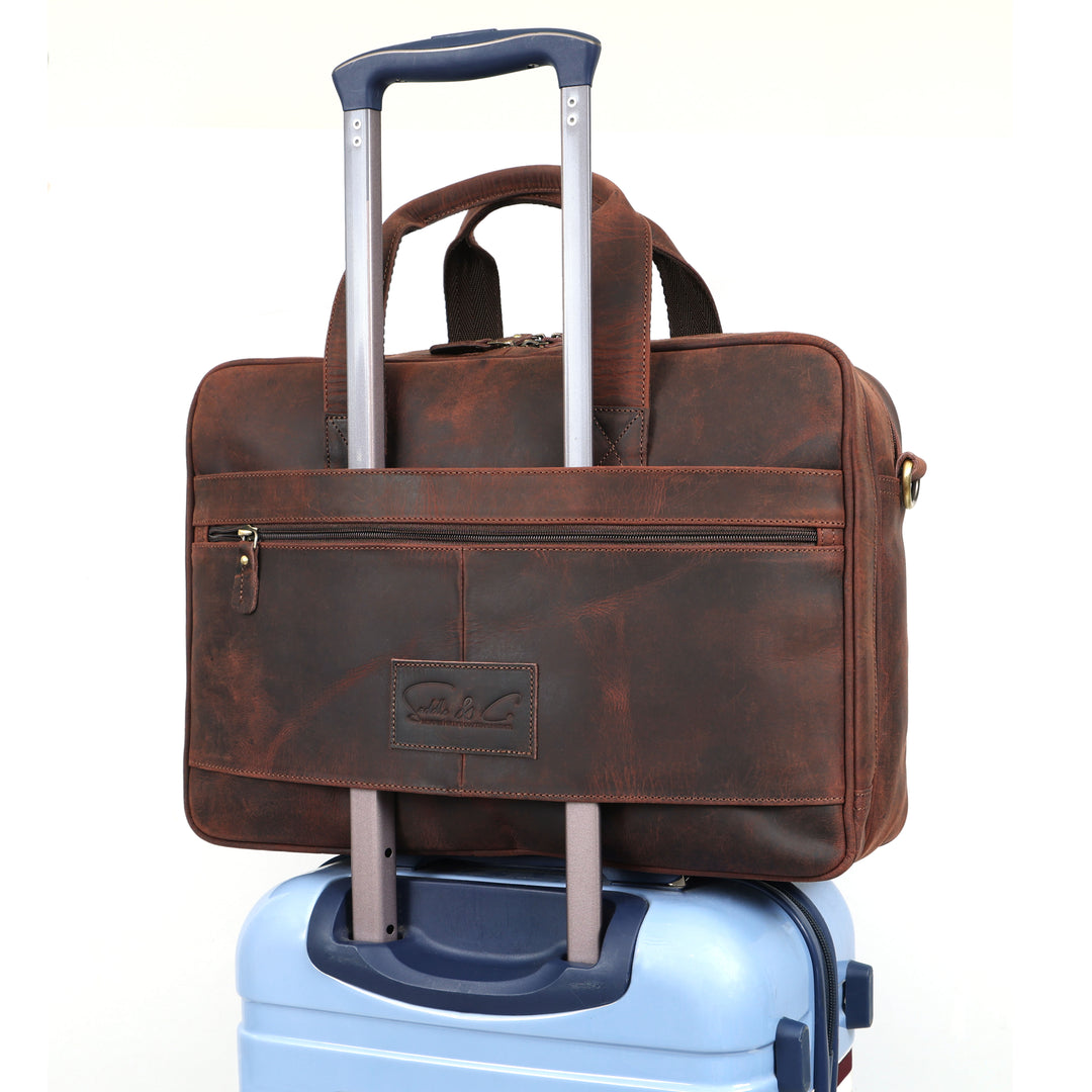 Brown leather briefcase with wheels on a white background