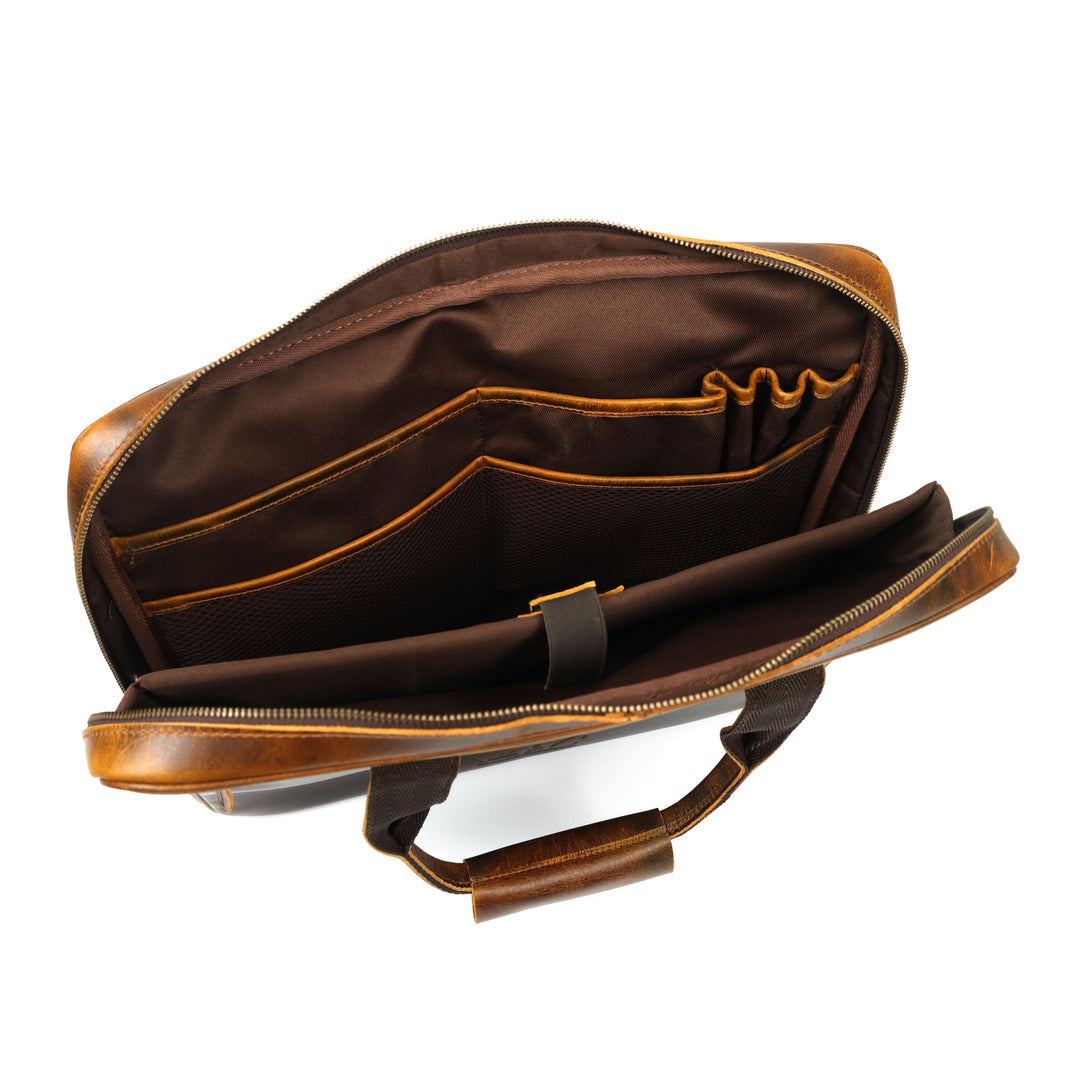Brown leather bag with open front pocket on a white background