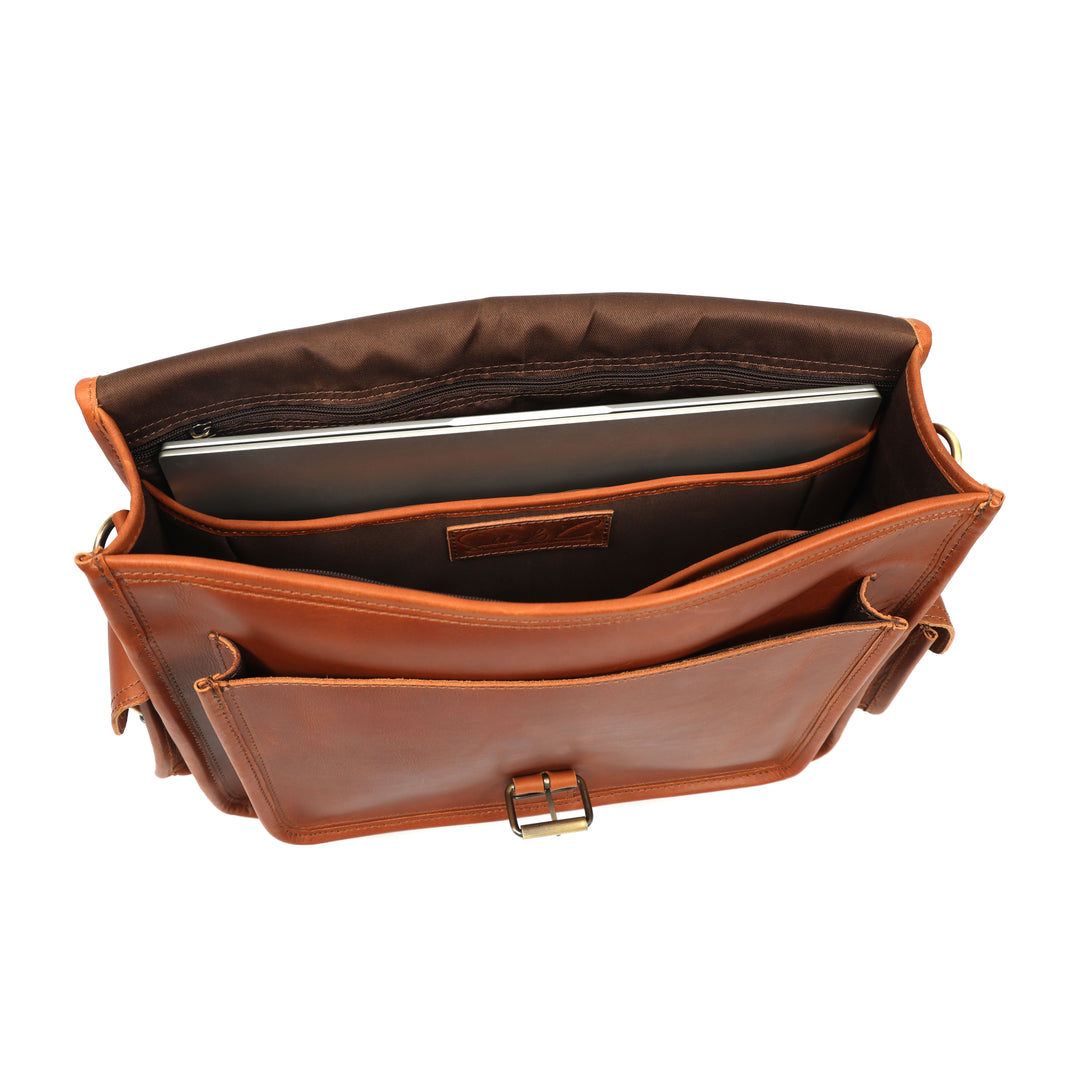 Brown leather briefcase with a laptop inside on a white background