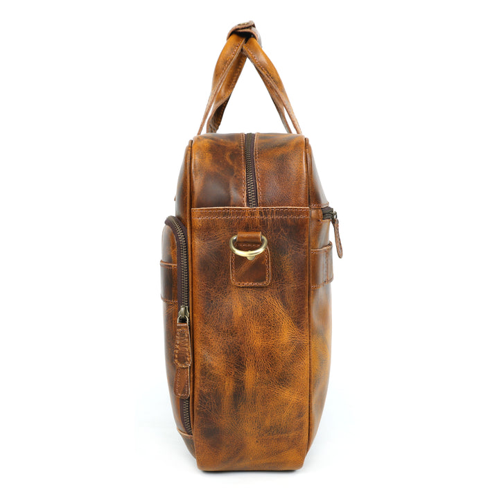 Brown leather bag with gold handle on a white background