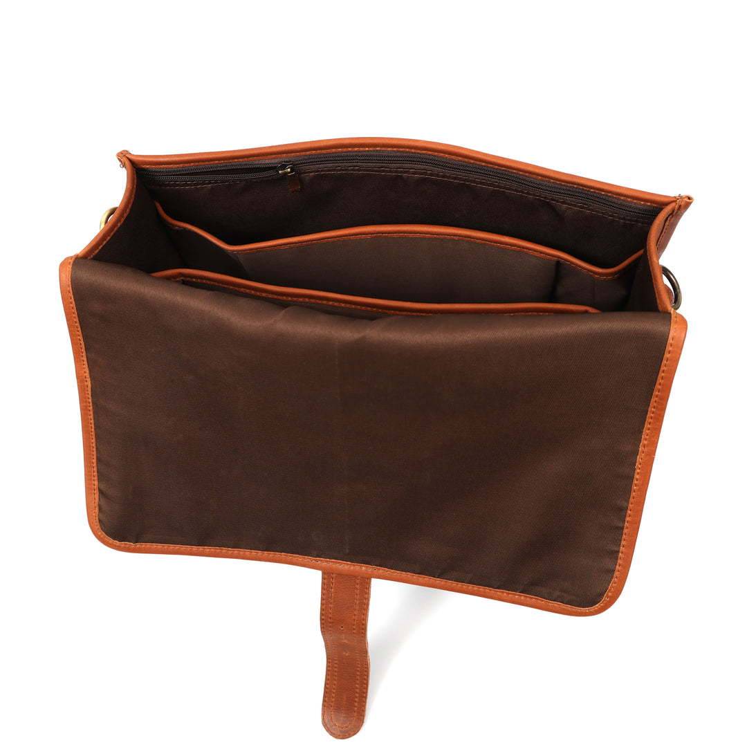 Brown leather bag with orange trim on a white background