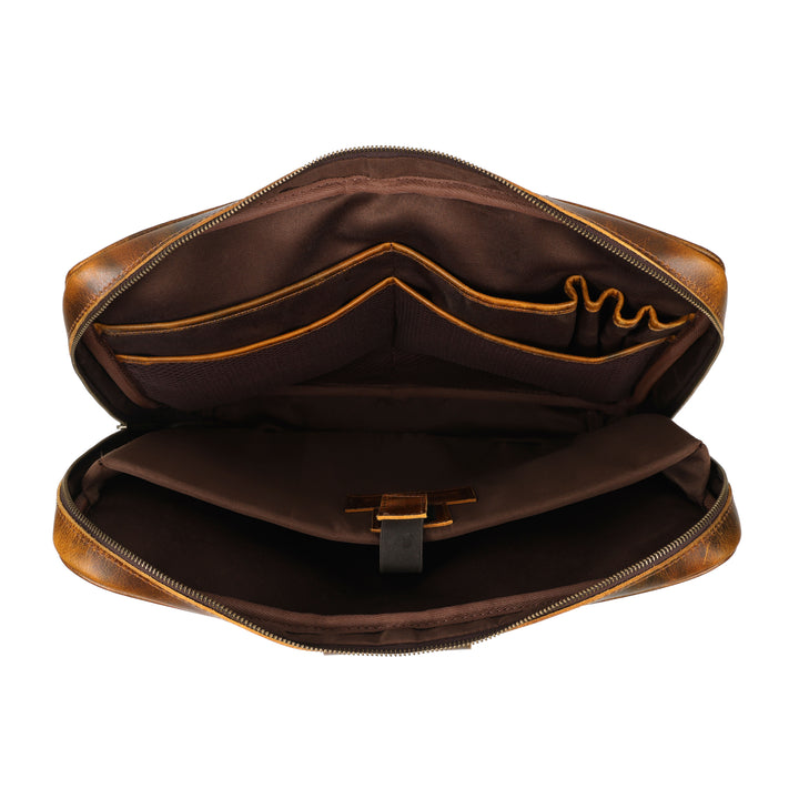 Brown leather bag with gold trim on a white background