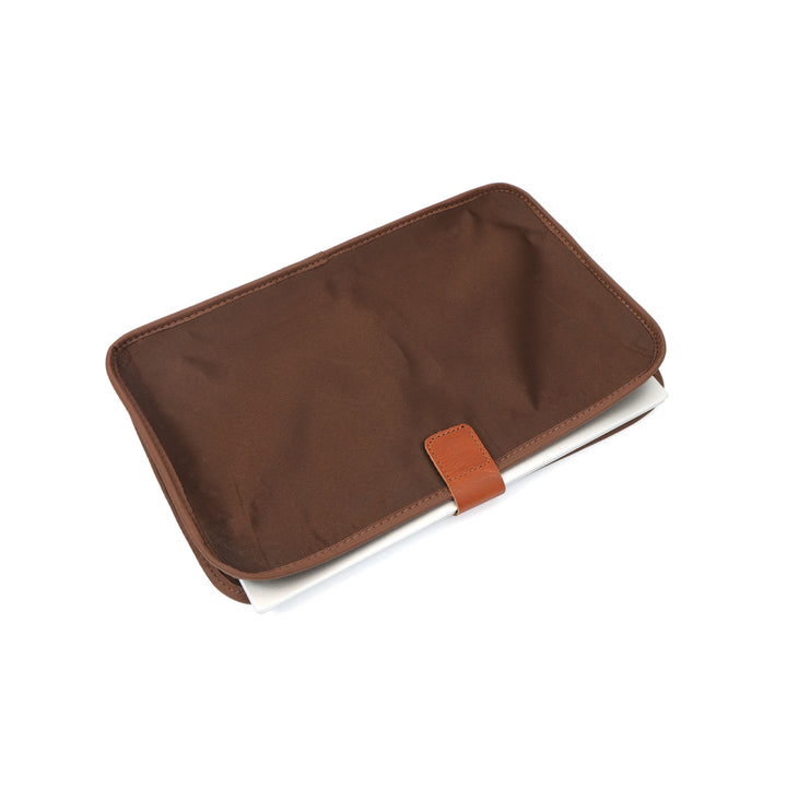 Brown leather wallet with a strap on a white background