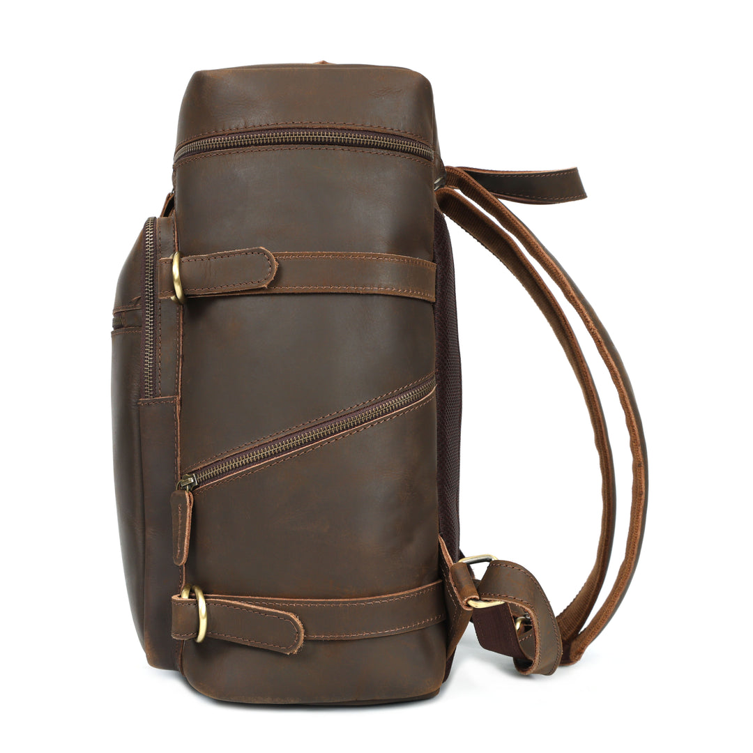 Brown leather backpack with gold zippers on a white background