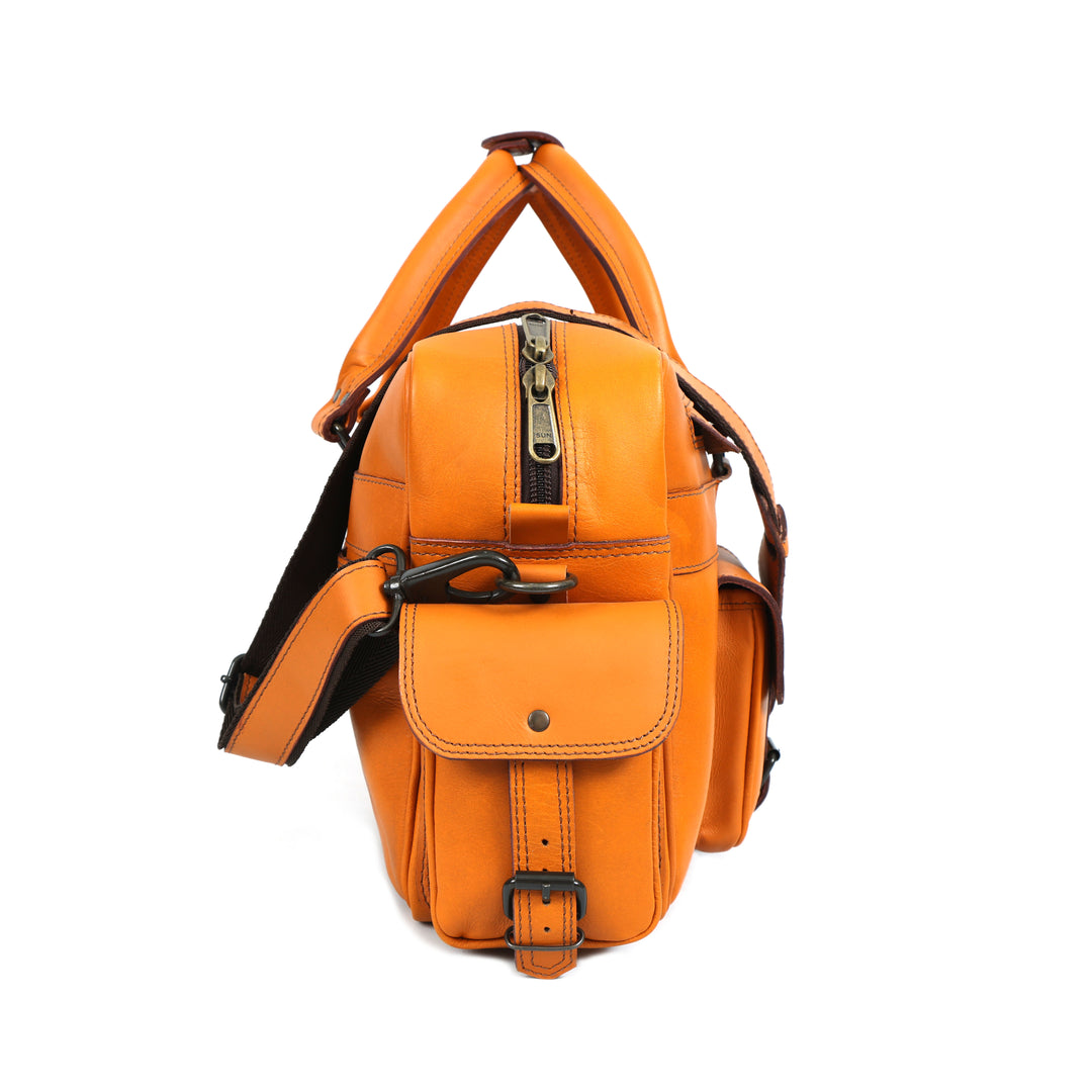 Orange leather backpack with a shoulder strap on a white background