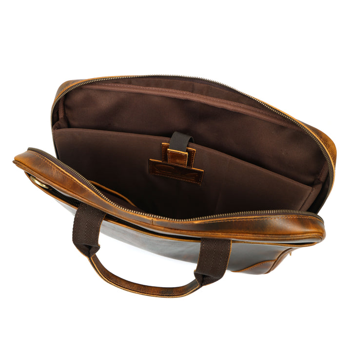 Brown leather briefcase with open lid on a white background