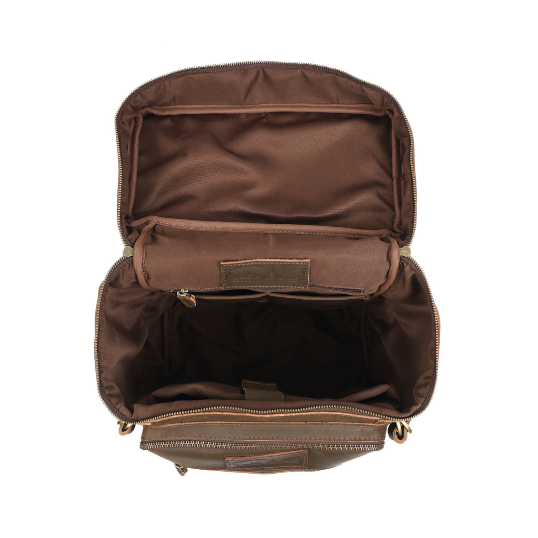 Brown leather bag with open compartments on a white background